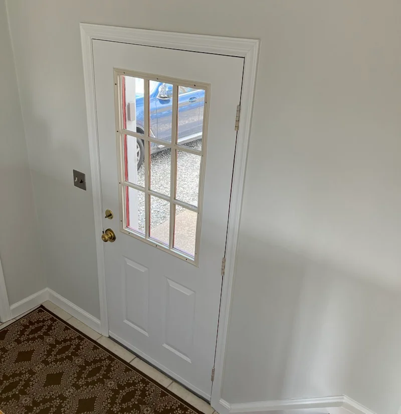 This steel entry door is rusting